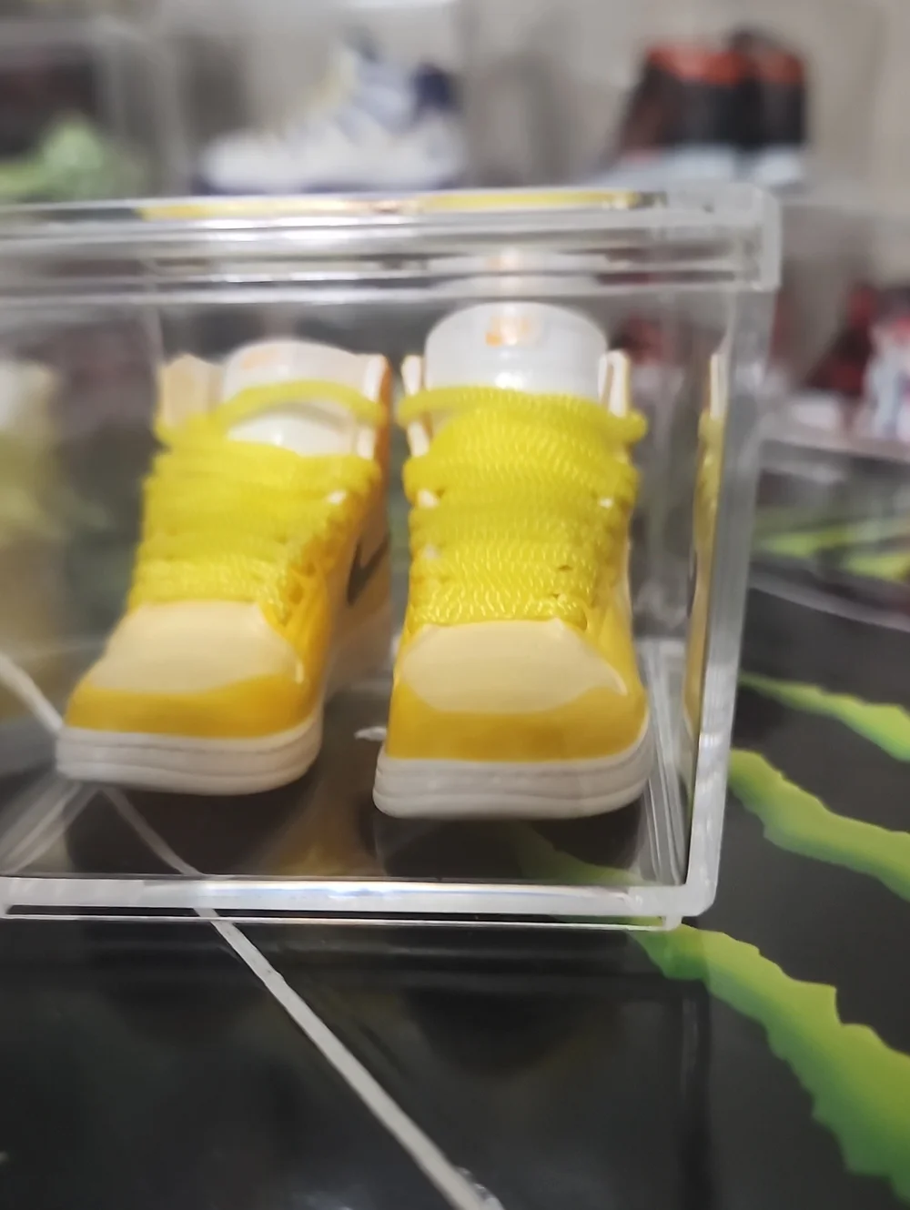 Yellow Mini Sneaker Display with Navy Swoosh
